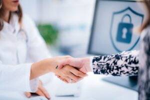 Handshake After Signing Medical Data Form